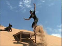 Sandboarding at Mount Mayhem, a tour attraction in EGoli iNingizimu Afrika