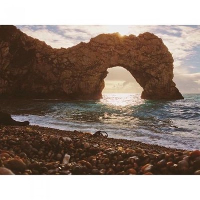 Durdle Door, a tour attraction in Dorset, United Kingdom 